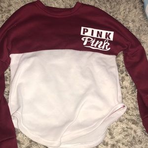 Red and white sweatshirt